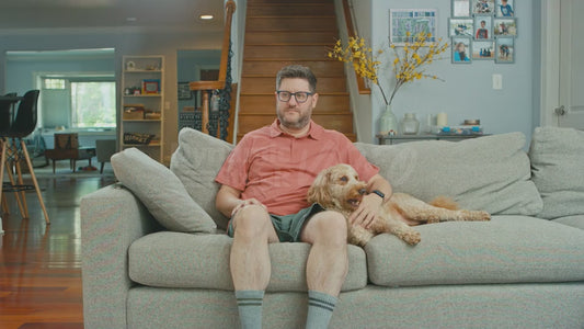 Man on Couch with Crossed Legs