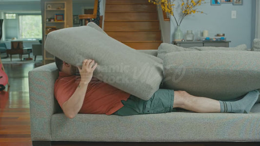 Man Hiding Inside of Couch