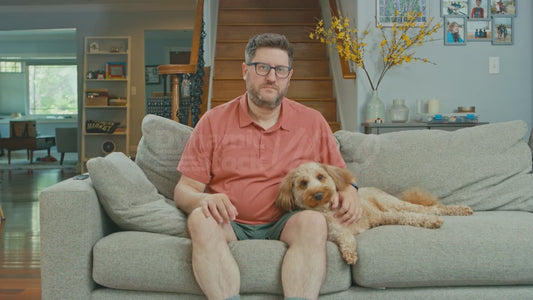 Man on Couch Besieged by Gnats